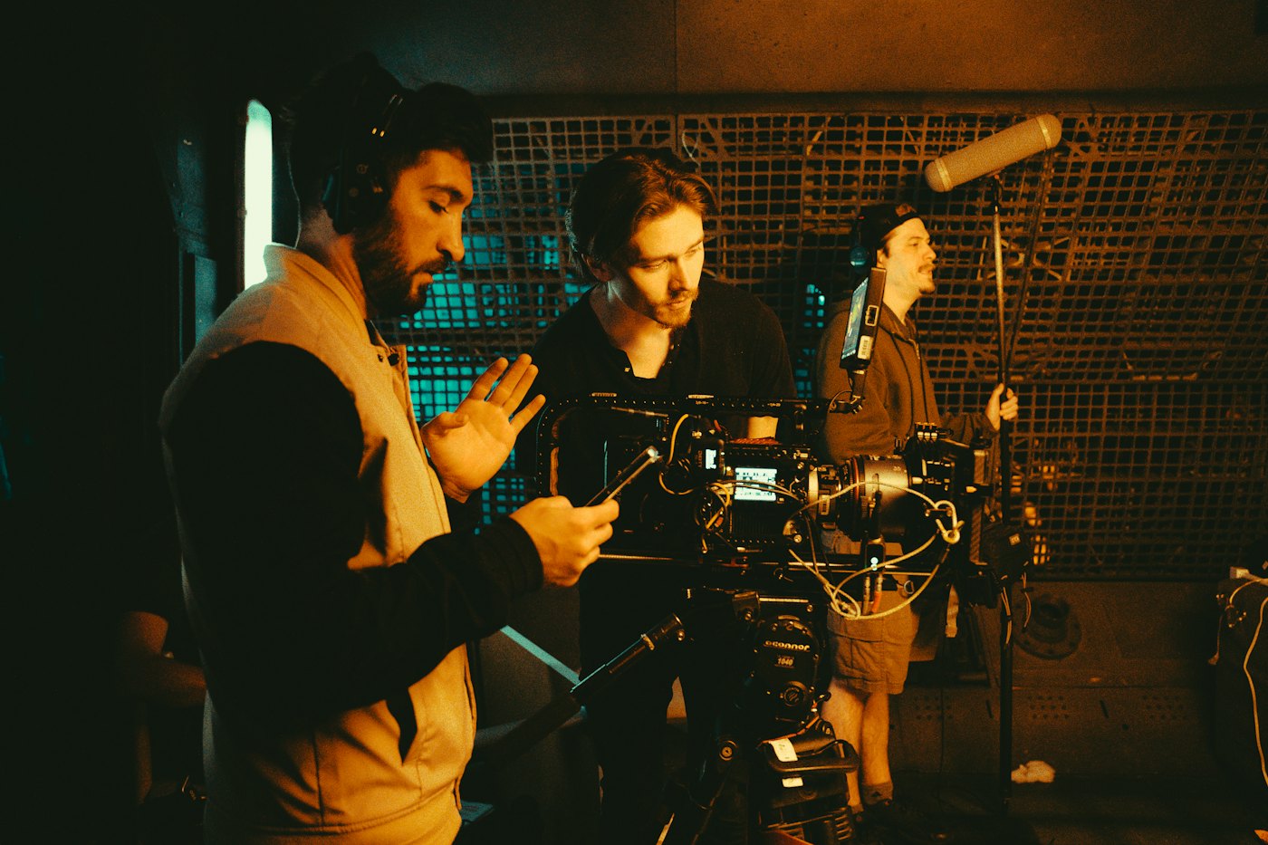 Student film crew setting up a camera